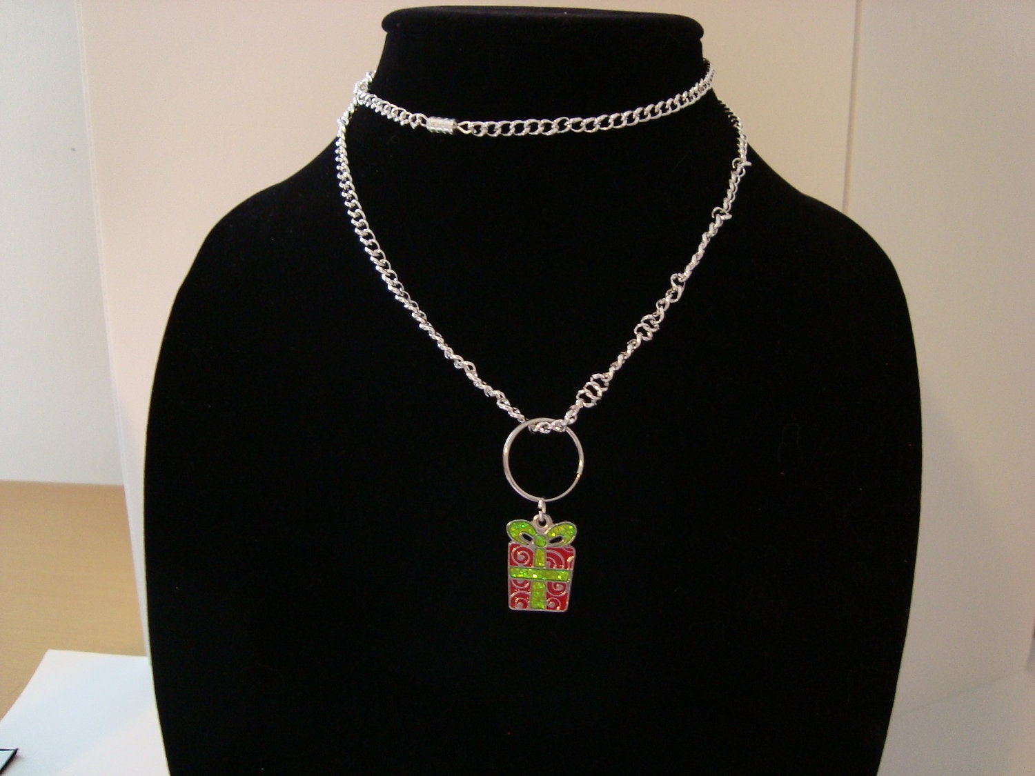 Holiday gift charm on silver chain necklace